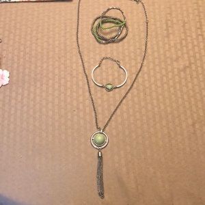 Set of 1 necklace, 2 bracelets, and 1 earring